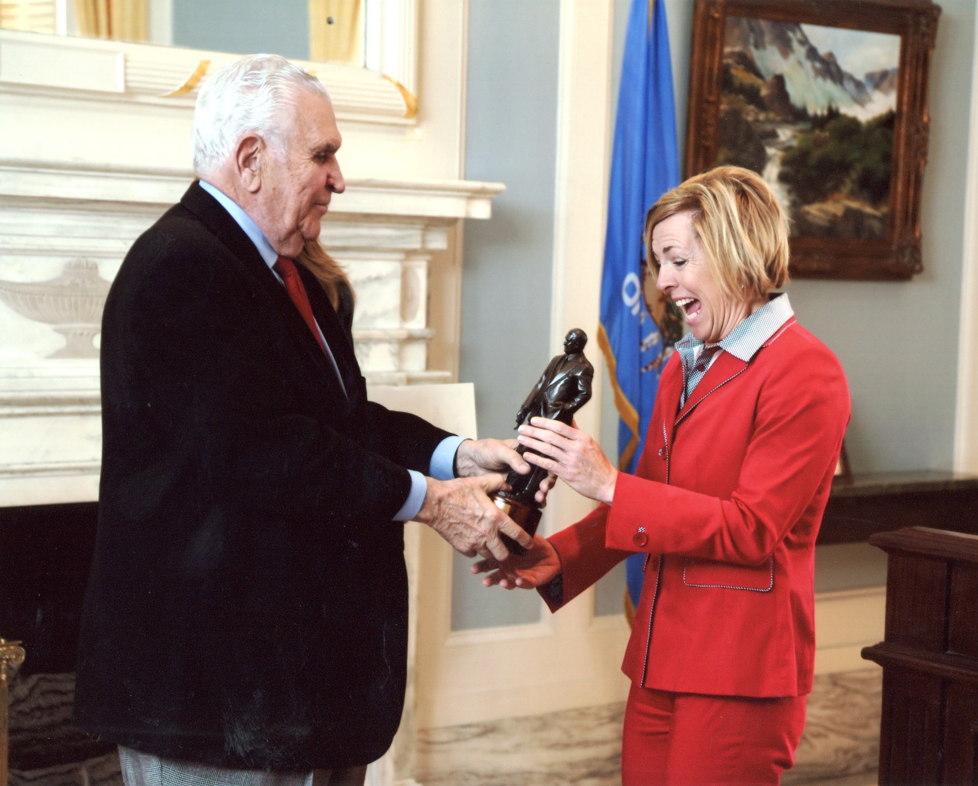 Tricia Everest receiving the Lee Allan Smith Oklahoma Legacy Award from Lee Allan Smith in 2013. Courtesy Oklahoma Hall of Fame Archives.